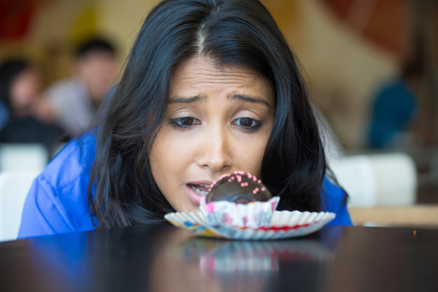 signs of an eating disorder (1) woman struggles with signs of an eating disorder